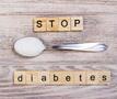 Stop diabetes en lepel met suiker