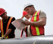mannen aan het werk op bouwwerf